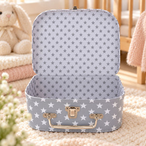 A light grey cardboard storage case with a star pattern