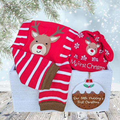 baby Christmas gift box with red outfit.