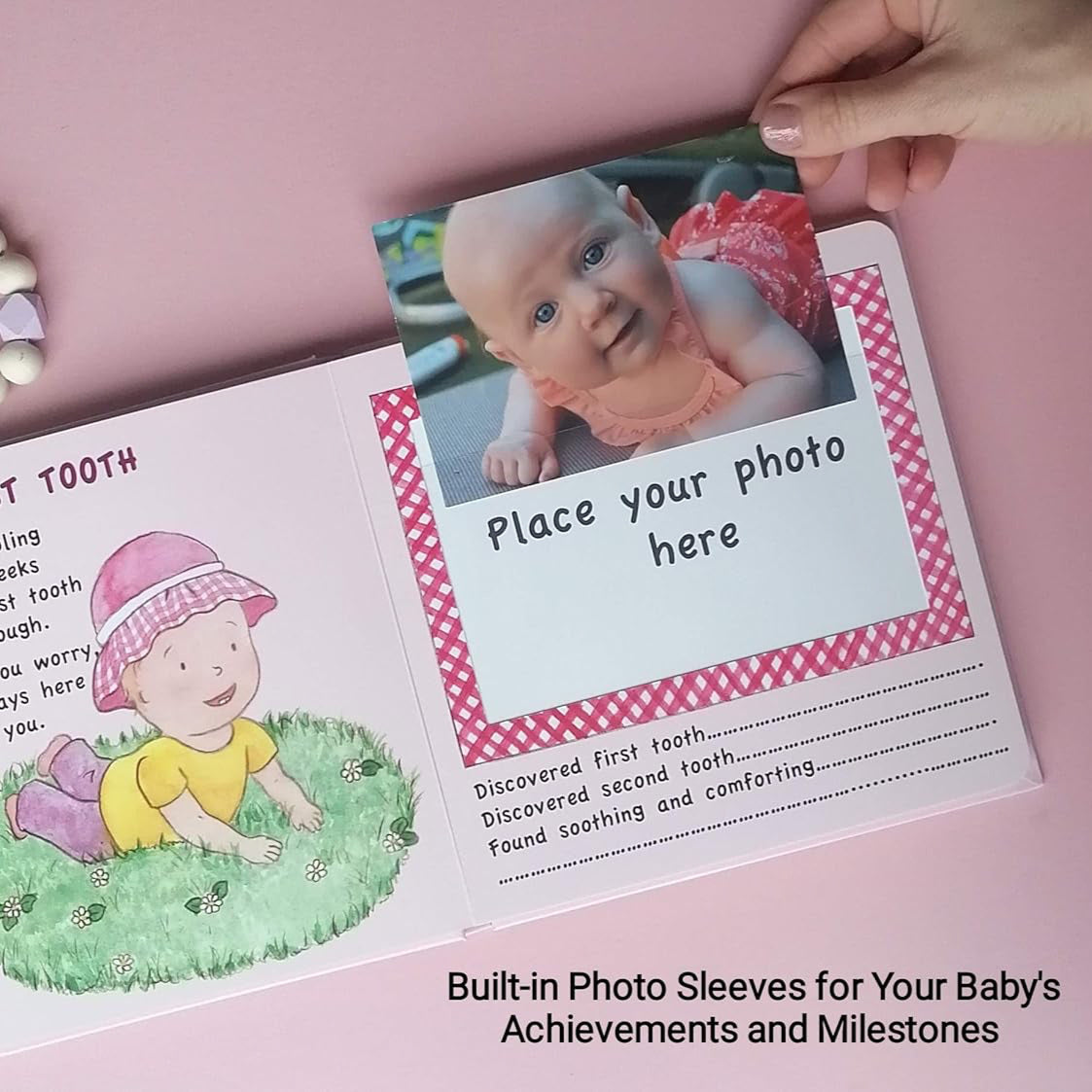 First tooth milestone page in baby girl photo book