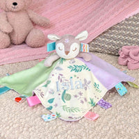 Flora Fawn taggie blanket baby comforter with tags and attached animal toy.