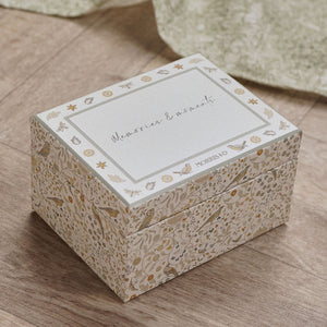 Closed floral baby memory box showing the decorated lid and patterned sides