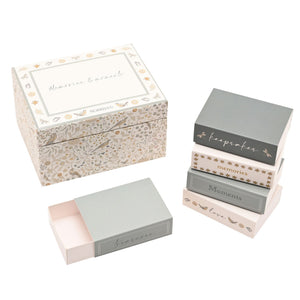 Floral keepsake box with stacked matchbox compartments and one drawer pulled open