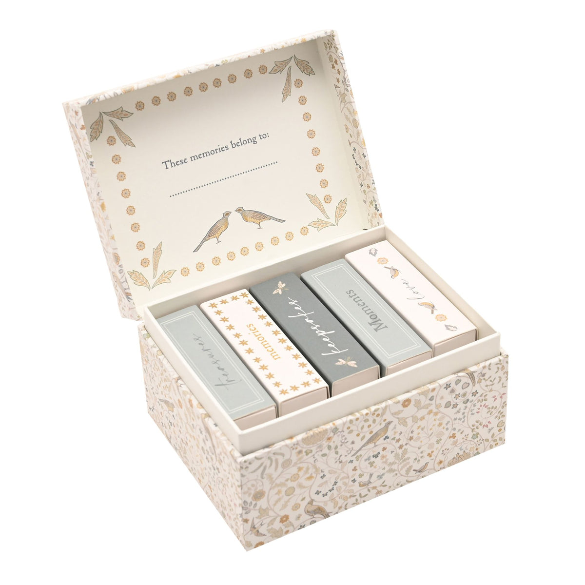 Open baby keepsake box with compartments and decorative name panel viewed from the right
