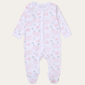 Baby sleepsuit with pink floral pattern