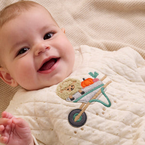 Soft quilted baby outfit with vegetable theme