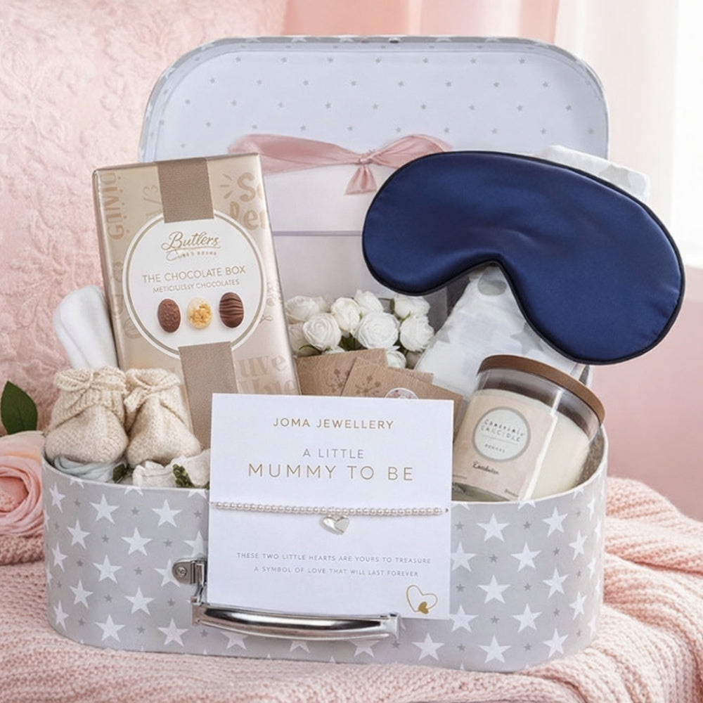 Gifts for expecting parents in a hamper with candle and chocolate by Bumbles and Boo.