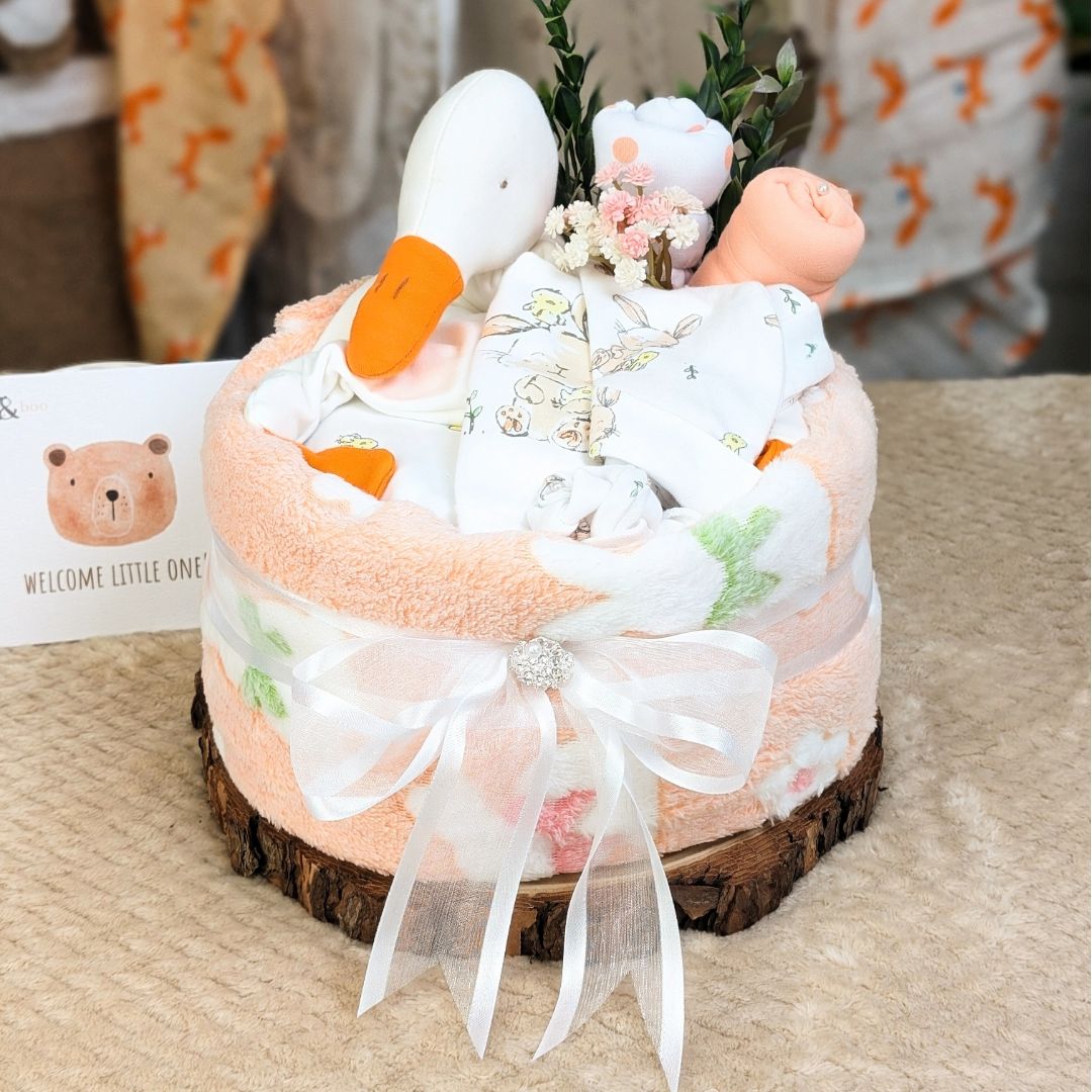 Baby nappy cake gift. Duck theme with blanket and nappies.  Perfect for baby shower.