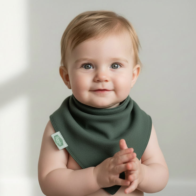 Dark green baby bandana dribble bib with soft cotton fabric and triangle shape, designed for everyday baby wear and feeding.