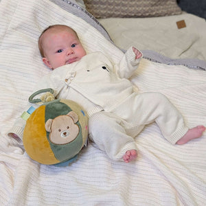 Soft green and beige baby activity ball soft toy