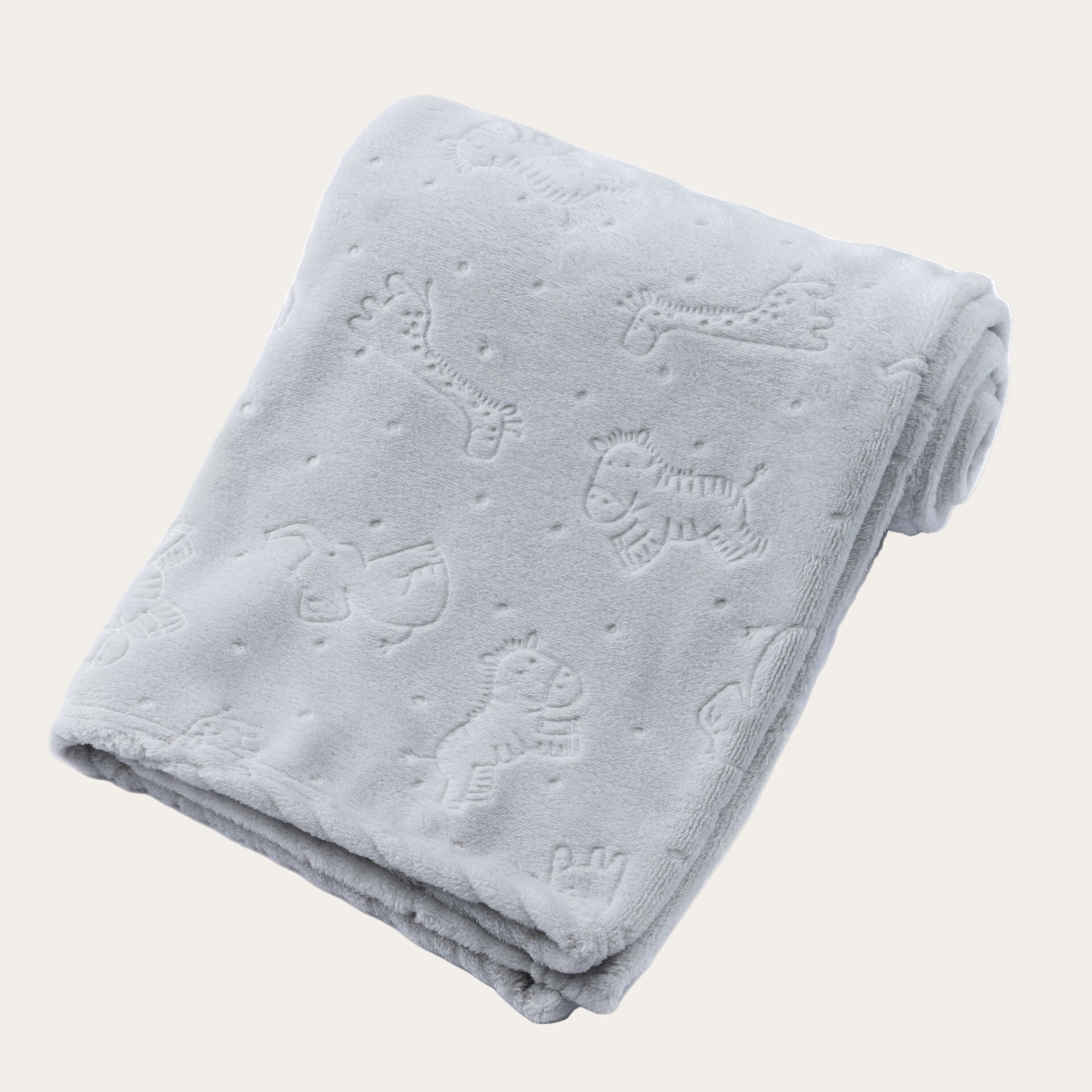 Folded gray blanket with safari animal pattern
