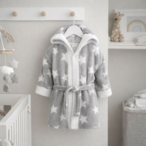 Grey baby dressing gown with white stars on and a little hood perfect for bath time.