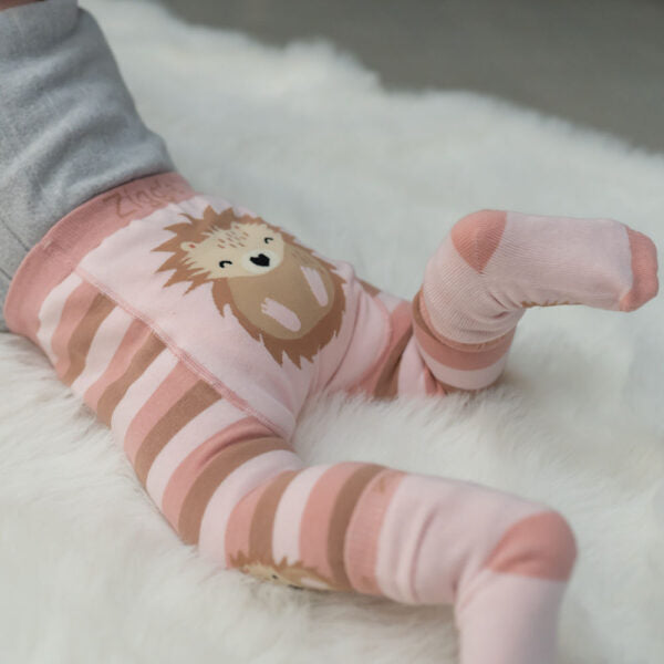Baby wearing hedgehog leggings and matching socks