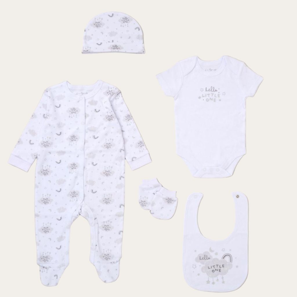 A white clothing set for a new baby with hello little one written