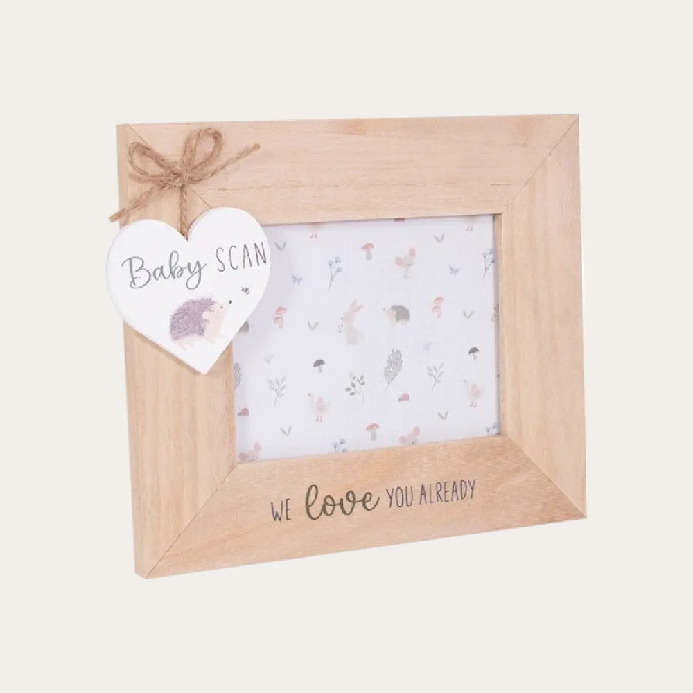 I love you already baby scan photo frame with wooden finish and garden tales design.
