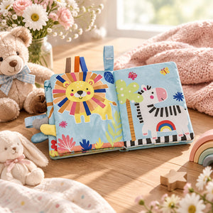 Jungle Friends cloth baby book open to colourful sensory pages