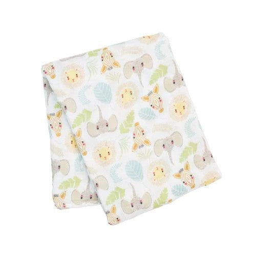 White muslin baby swaddle with jungle pattern