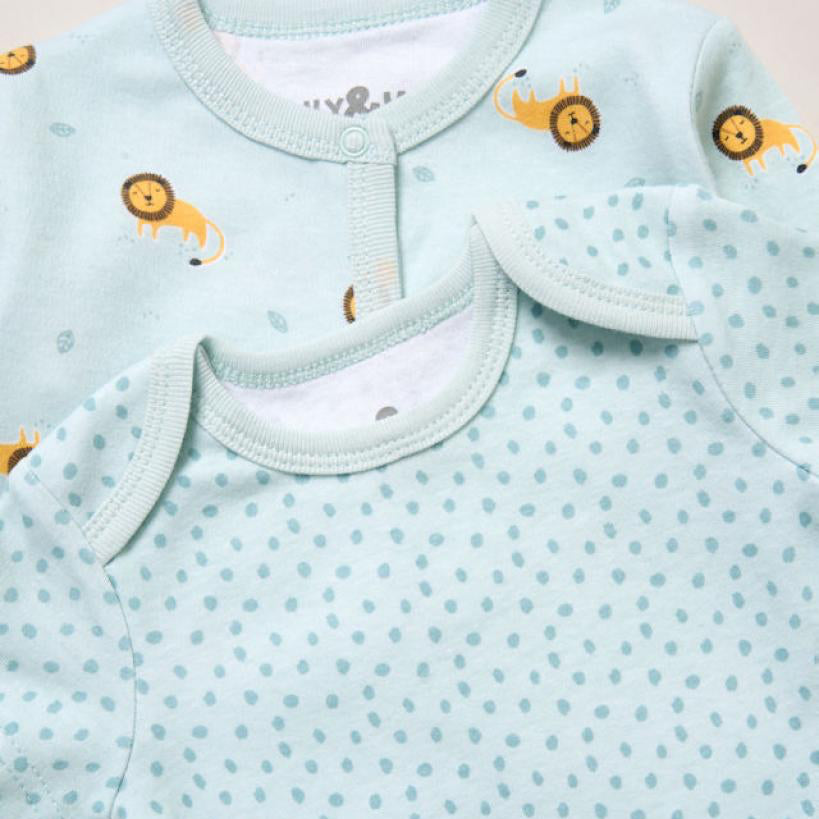 Jungle-inspired baby clothing set in blue