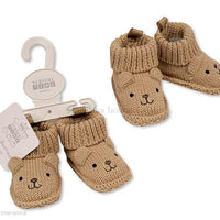 Knitted baby booties with beige bear face embroidery and ears in a soft neutral colour, suitable for newborn babies.