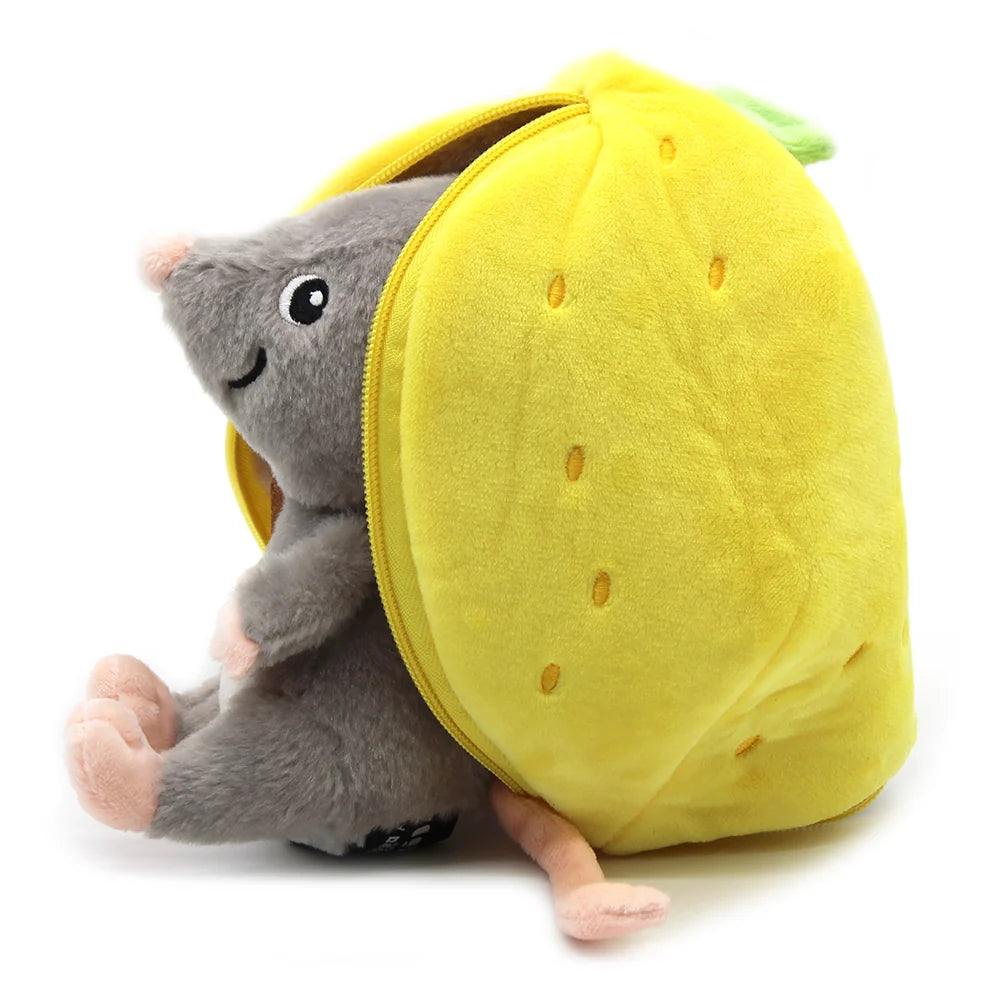 Side view of the grey mouse emerging from the unzipped yellow lemon plush cover.