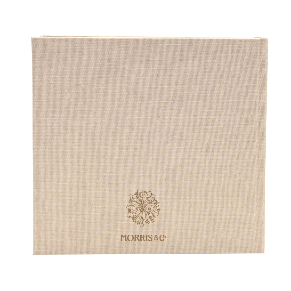 Back of neutral linen baby album with a small gold emblem