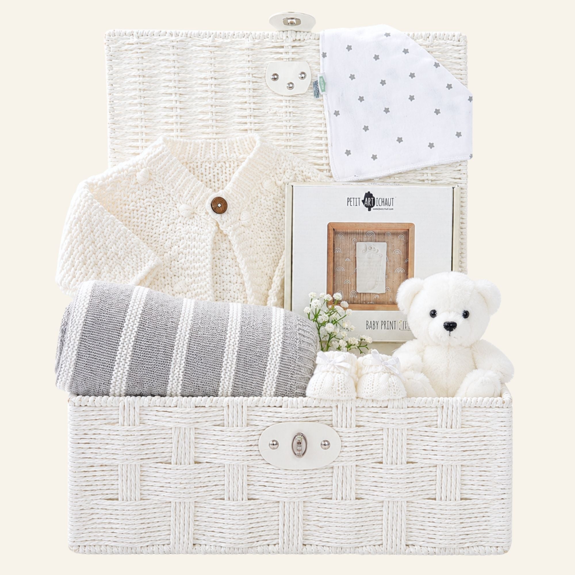 New baby gifts basket with grey and white blanket and baby print frame 
