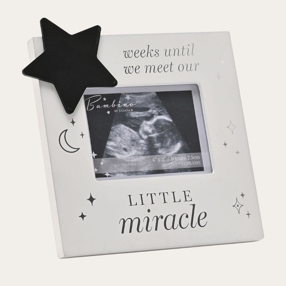 Pregnancy scan frame with a star chalkboard