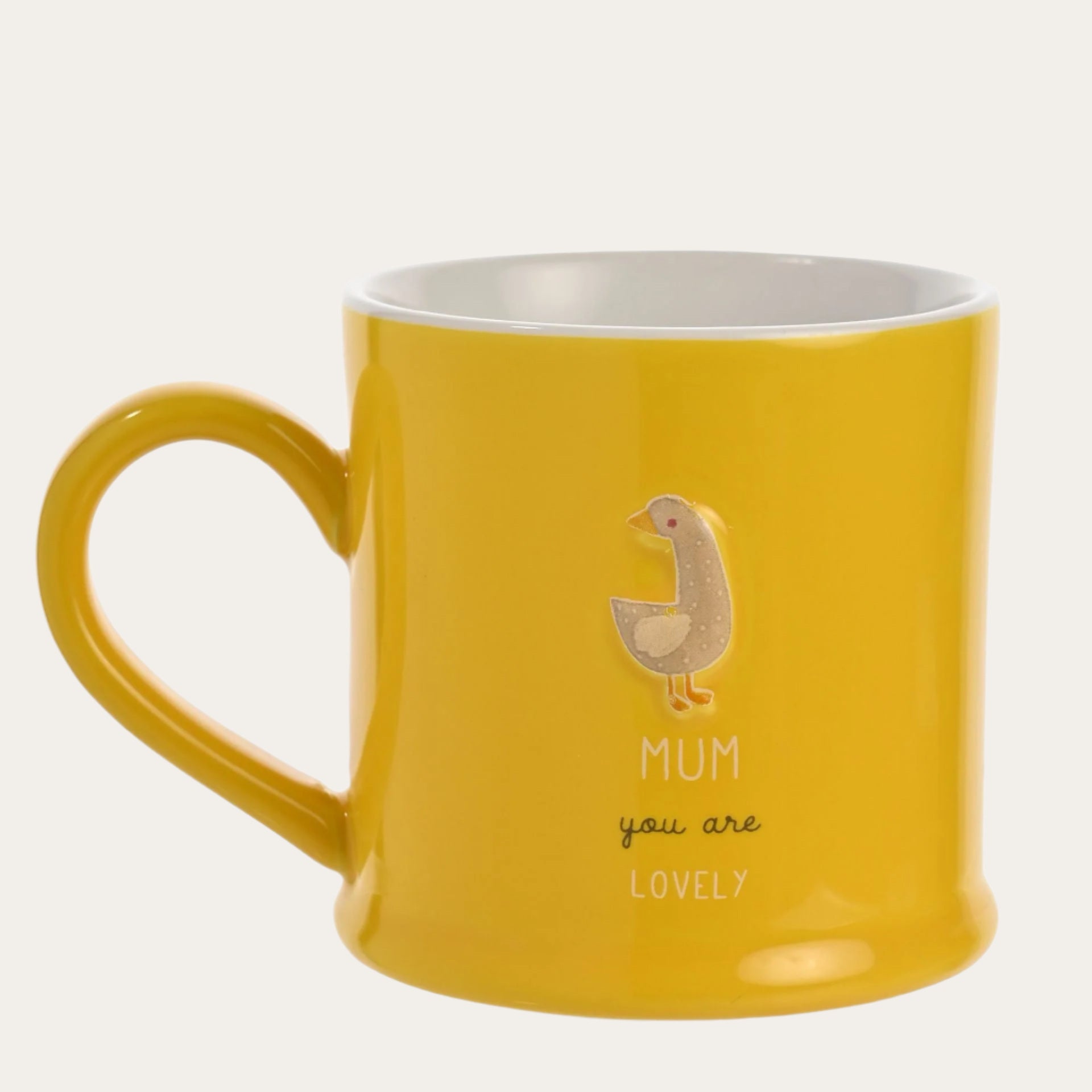 Yellow mug with a bird illustration and text on a white background