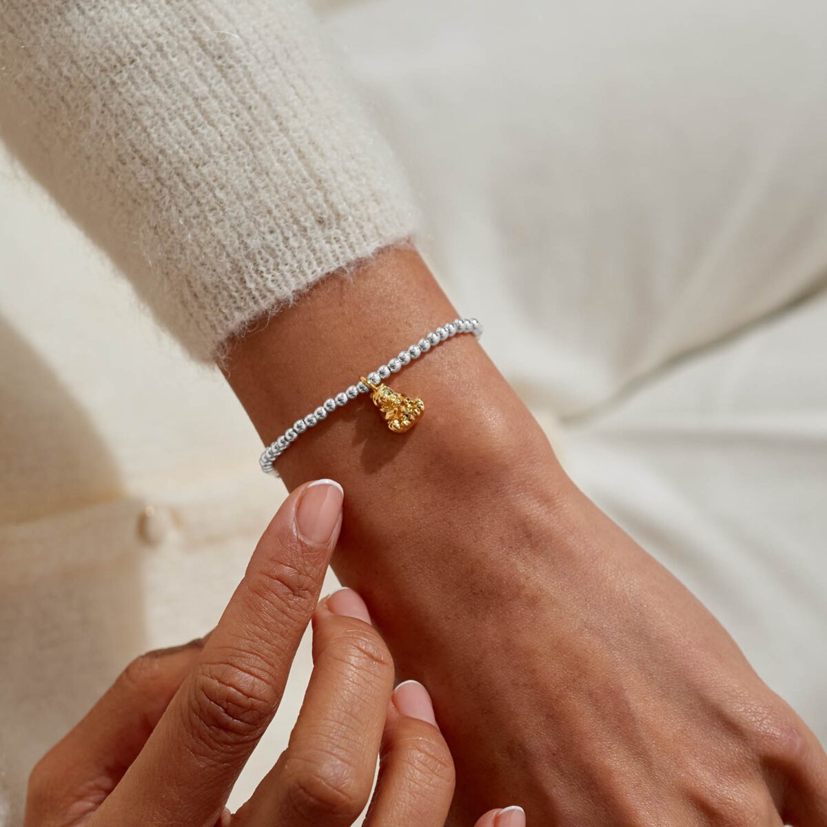 Mama Bear silver and gold-plated sentiment bracelet detail