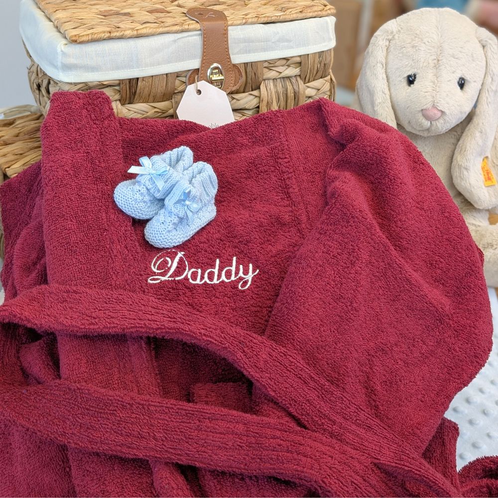 Maroon dressing gown with Daddy embroidered.