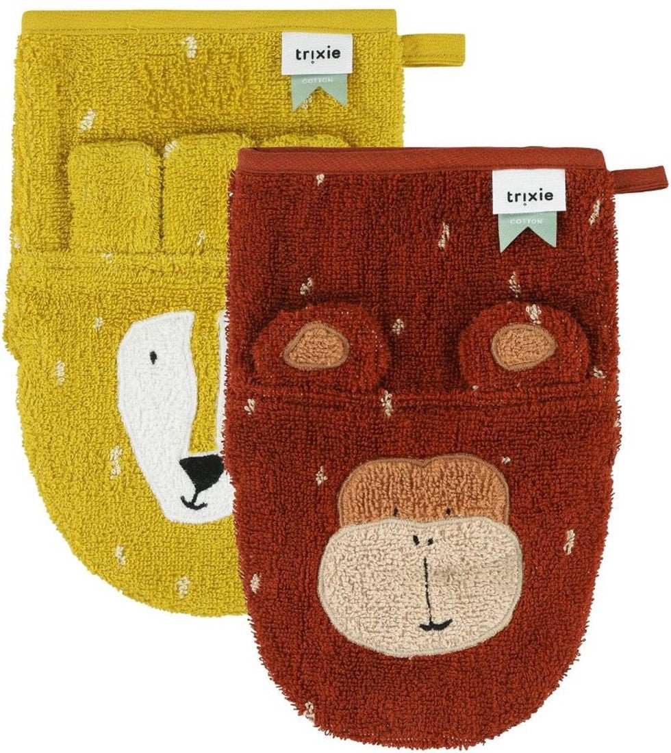 A yellow lion washcloth and a rust-red monkey washcloth