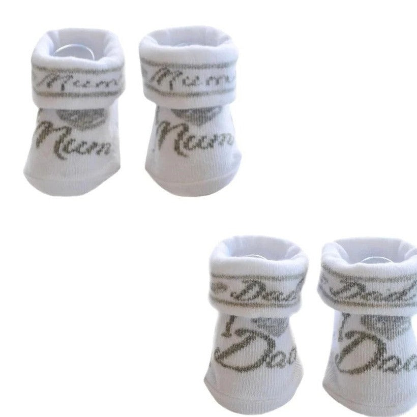 2 pairs of white baby socks with grey wording that reads "I heart Mum' and 'I heart Dad'