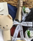 mum to be gift hamper features a bathrobe for both Mummy and baby, organic skincare, chocolates, and a beautiful Steiff teddy bear, ensuring a thoughtful and delightful experience for the parents to be.
