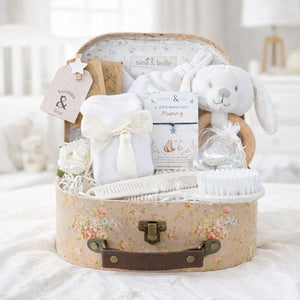Mum to be gifts in a little hamper luggage trunk with chocolates for mum and organic tea
