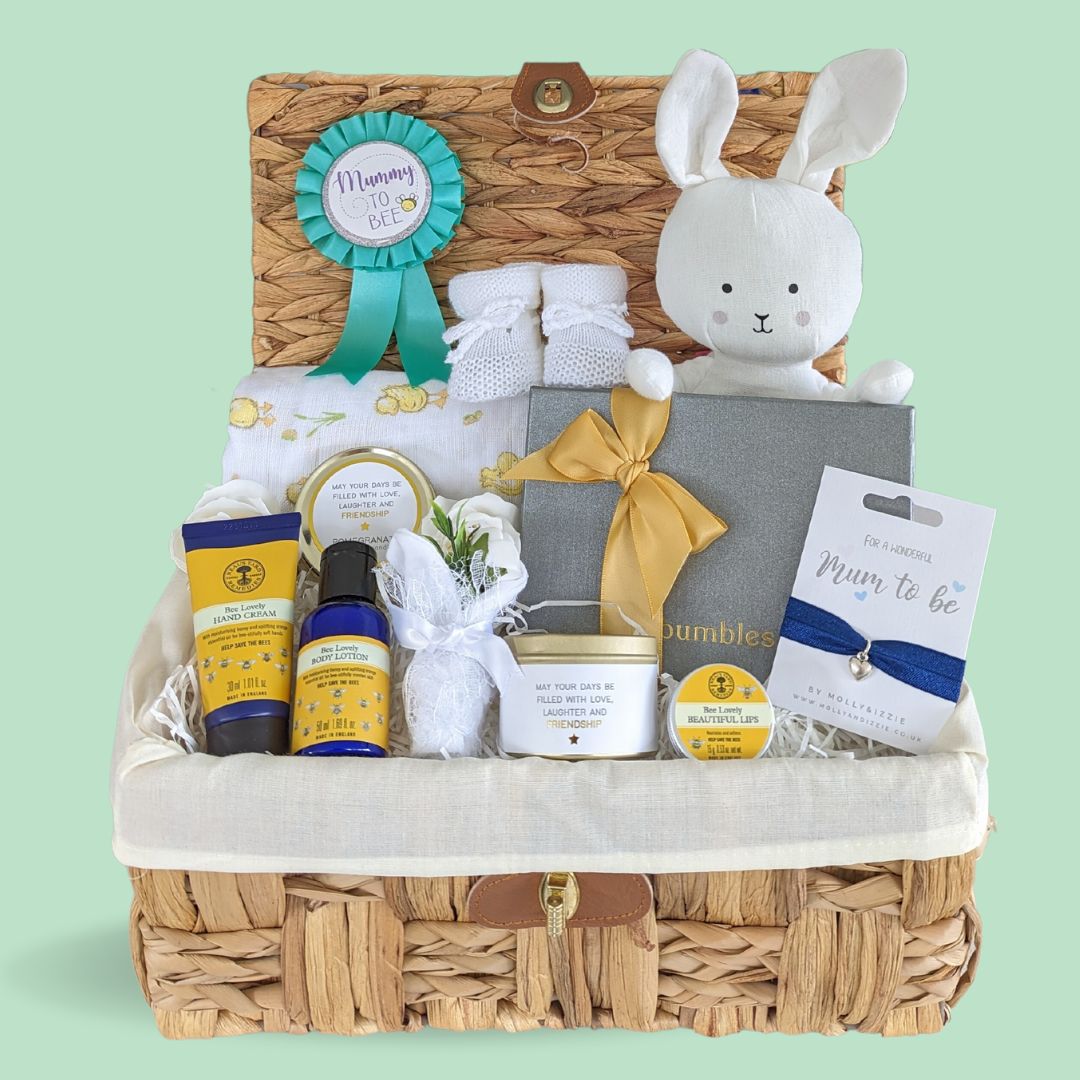 Stunning Mum to Be Pregnancy Hamper Gift with chocolates, organic pamper skincare, bracelet, candle, mummy to be badge and gifts for the baby. 