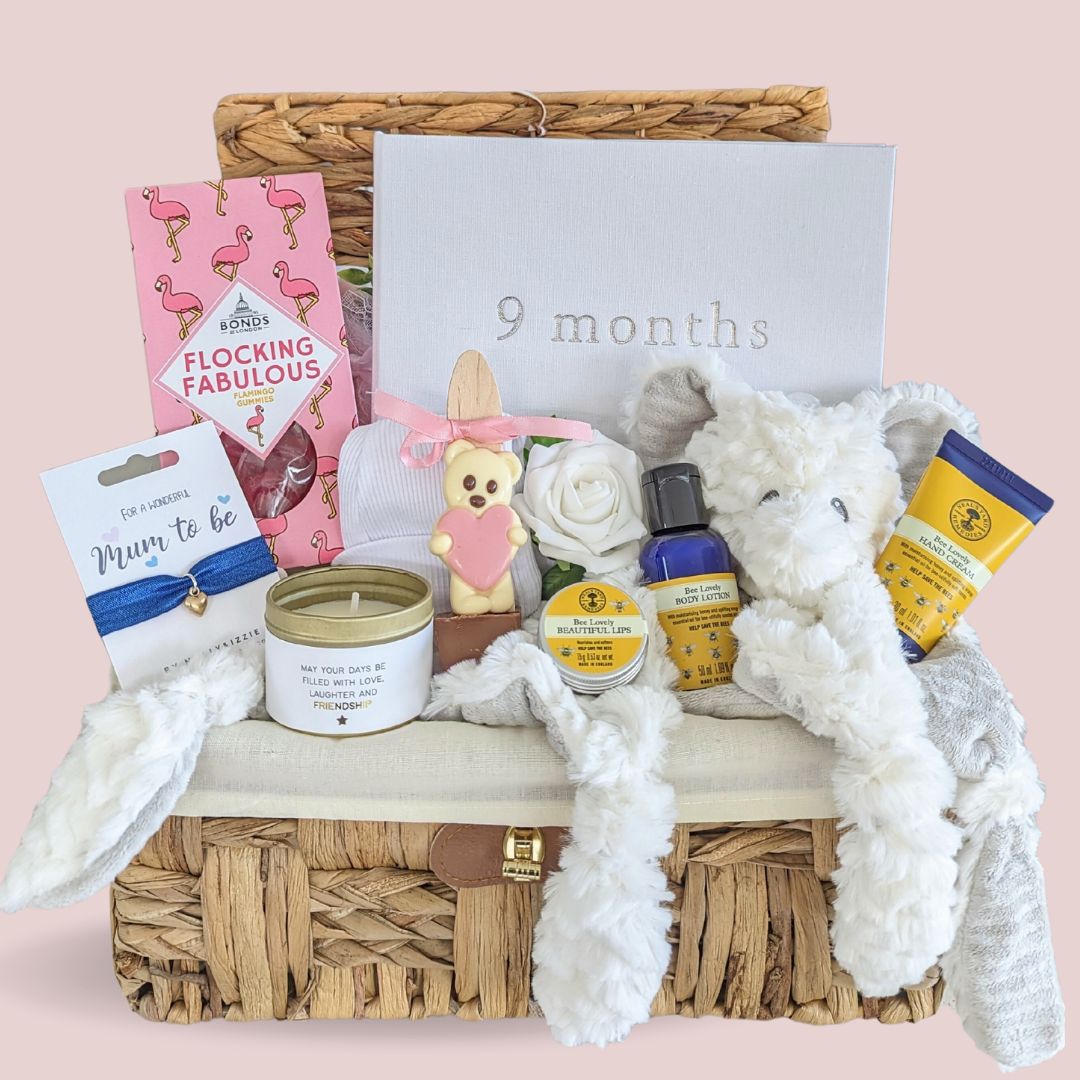 Stunning Mum to Be Pregnancy Hamper Gift with chocolates, organic pamper skincare, bracelet, candle and gifts for the baby. 