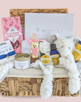 Stunning Mum to Be Pregnancy Hamper Gift with chocolates, organic pamper skincare, bracelet, candle and gifts for the baby. 