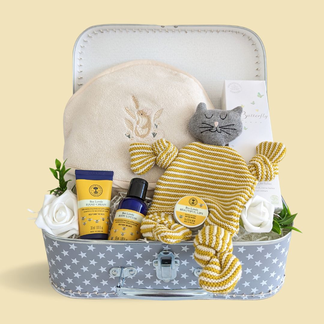 mum to be hamper with organic products for mum and baby towel and comforter for baby.