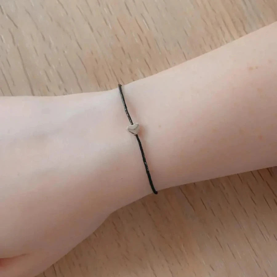 Mummy wish string bracelet with silver heart charm on black waxed cotton cord