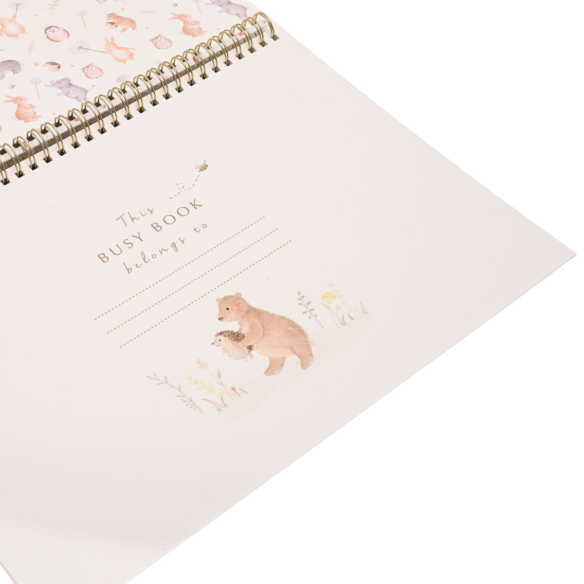 Close-up of the busy book name page with writing lines and an illustrated bear.