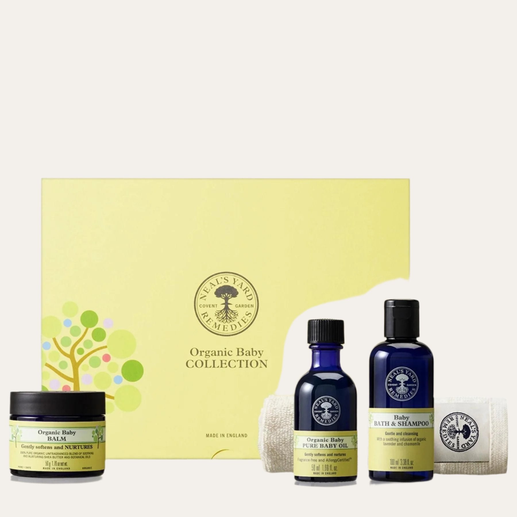 Neal's Yard Remedies organic baby collection. Includes baby oil, baby balm & baby bath & shampoo in a yellow box.