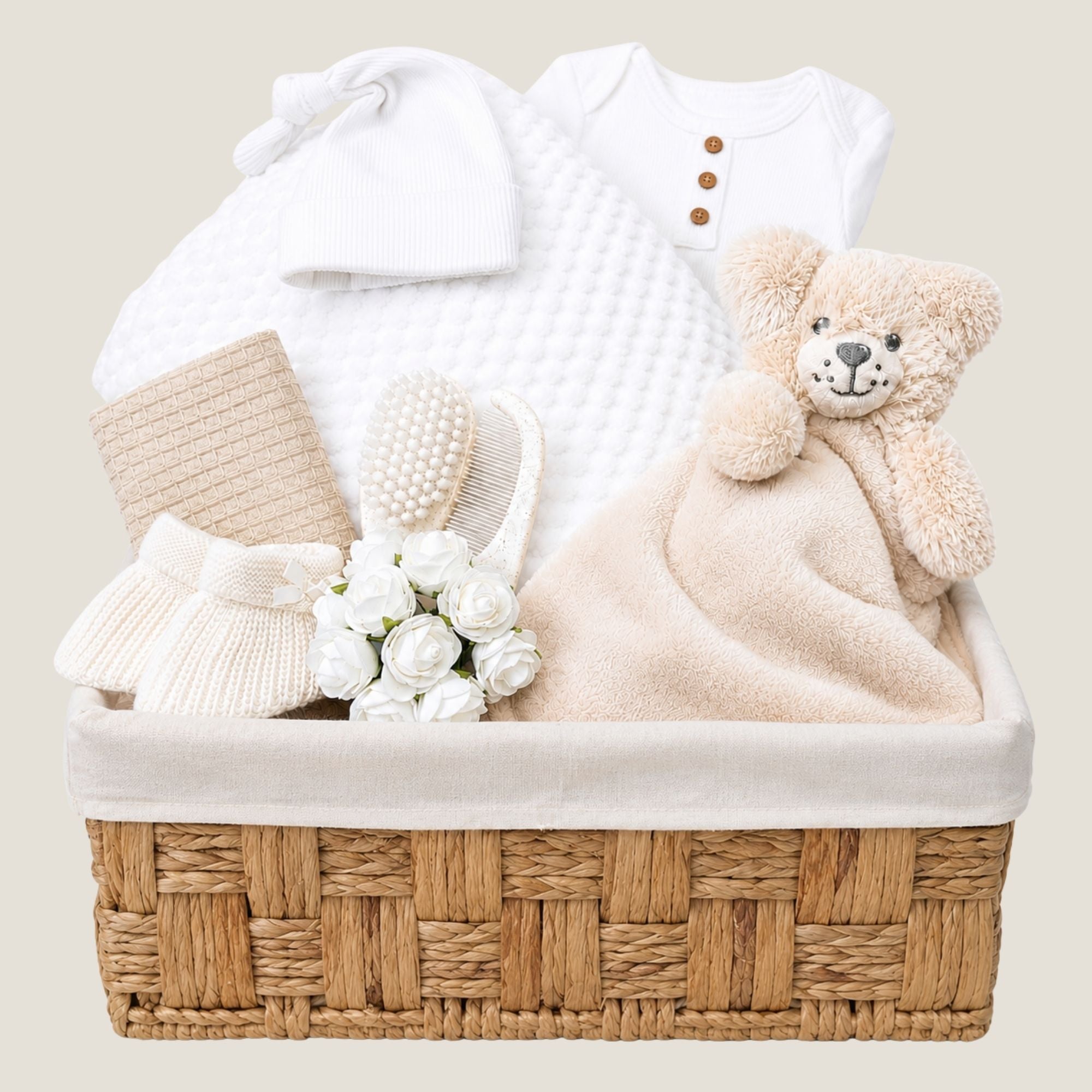 Newborn Baby Gifts Hamper Basket  with blanket and white clothes. Hamper by Bumbles and Boo.