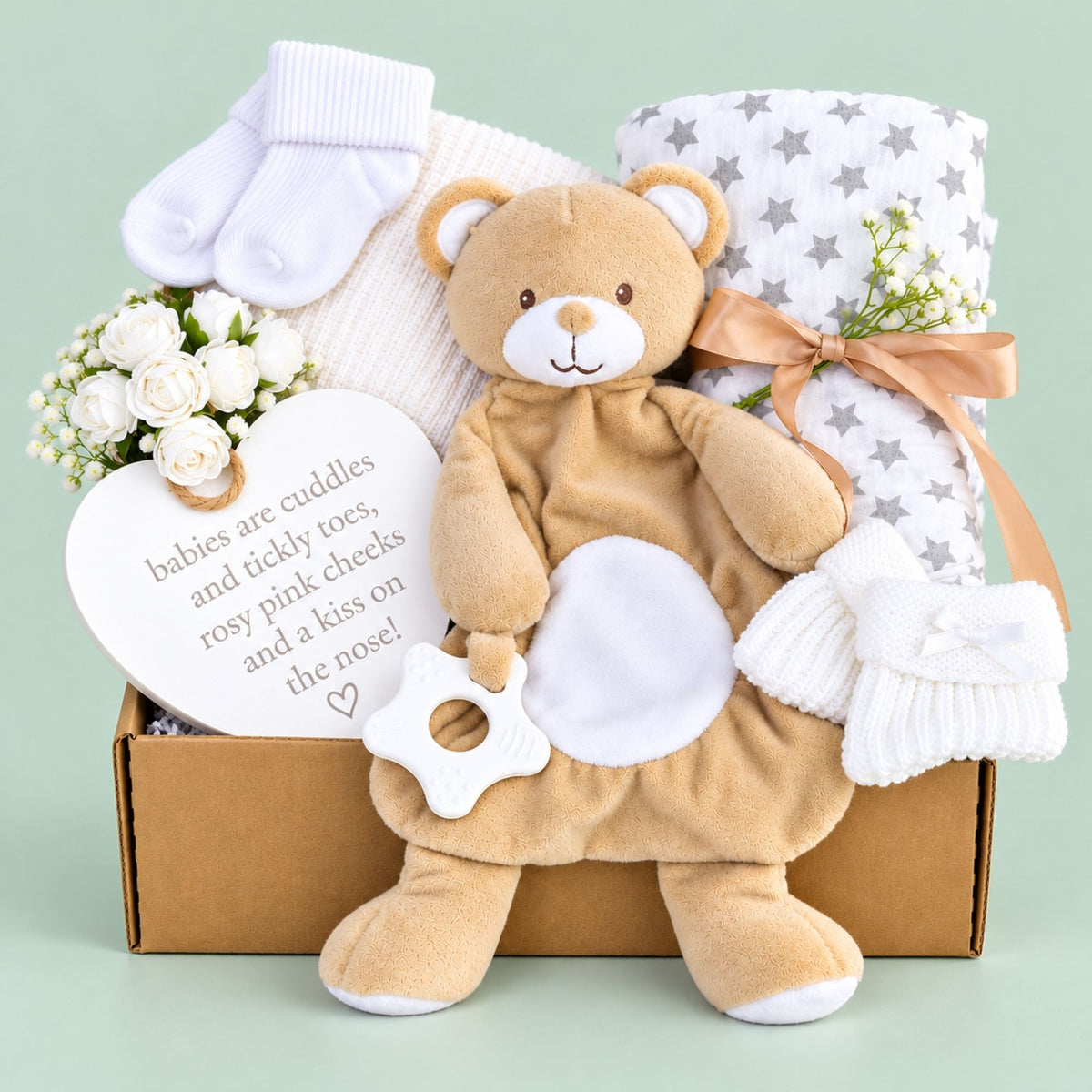 Eco friendly new baby gifts box with bear comforter and teething toy by Bumbles and Boo. Hamper contains baby essentials and presents.