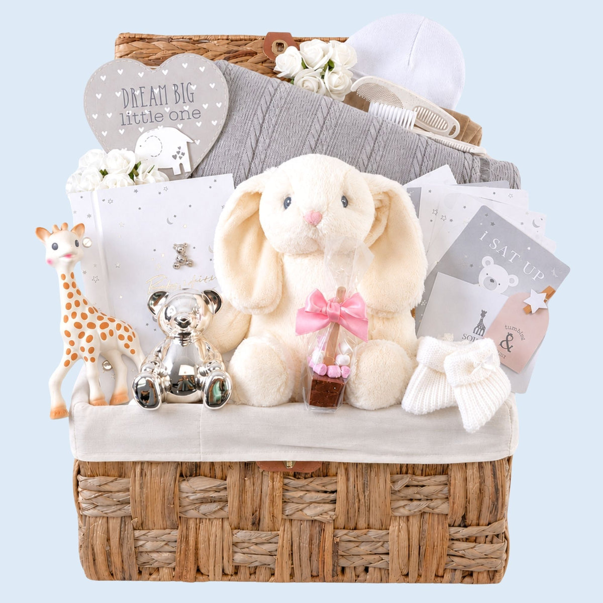 Baby gifts hamper in Neutral tones filled with presents, treats and gifts for baby.