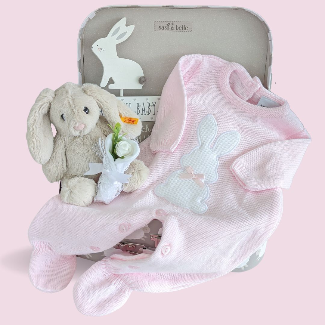 New baby girl gifts with bunny romper, steiff bunny and decorative plaque.