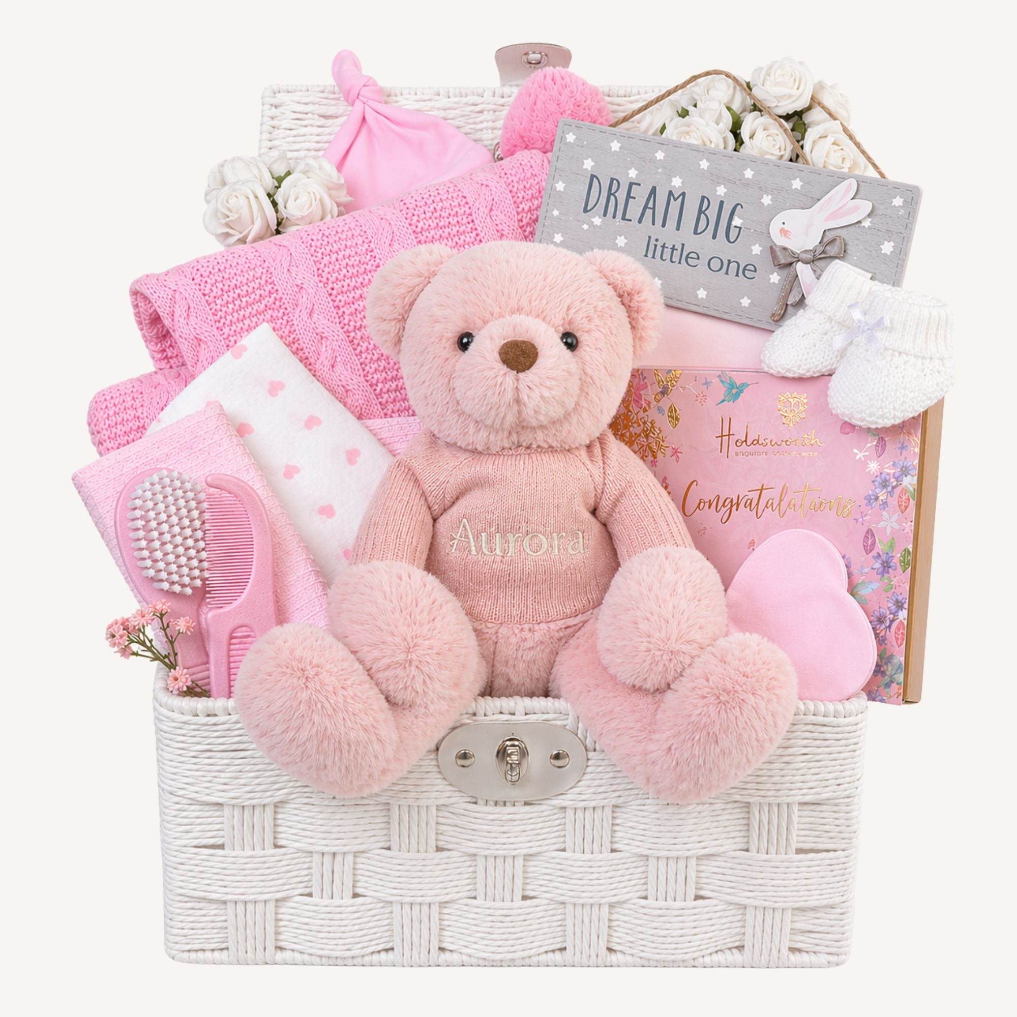Large baby girl gift hamper basket with personalised teddy bear, pink blanket and chocolates for the new parents.