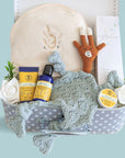 Luxury new baby boy hamper trunk with gifts for both baby and mummy. Organic baby lotion, organic cotton towel, soft comforter toy for baby and organic neal's yard for a new mummy.