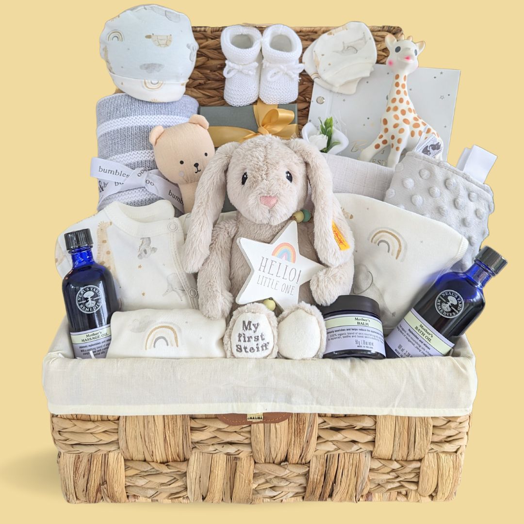 Large new mum hamper basket with gifts for both baby and a new mum.