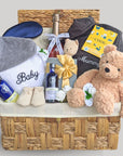 This new mum gift hamper features a bathrobe for both Mummy and baby, organic skincare, chocolates, and a beautiful Steiff teddy bear, ensuring a thoughtful and delightful experience for the new family.