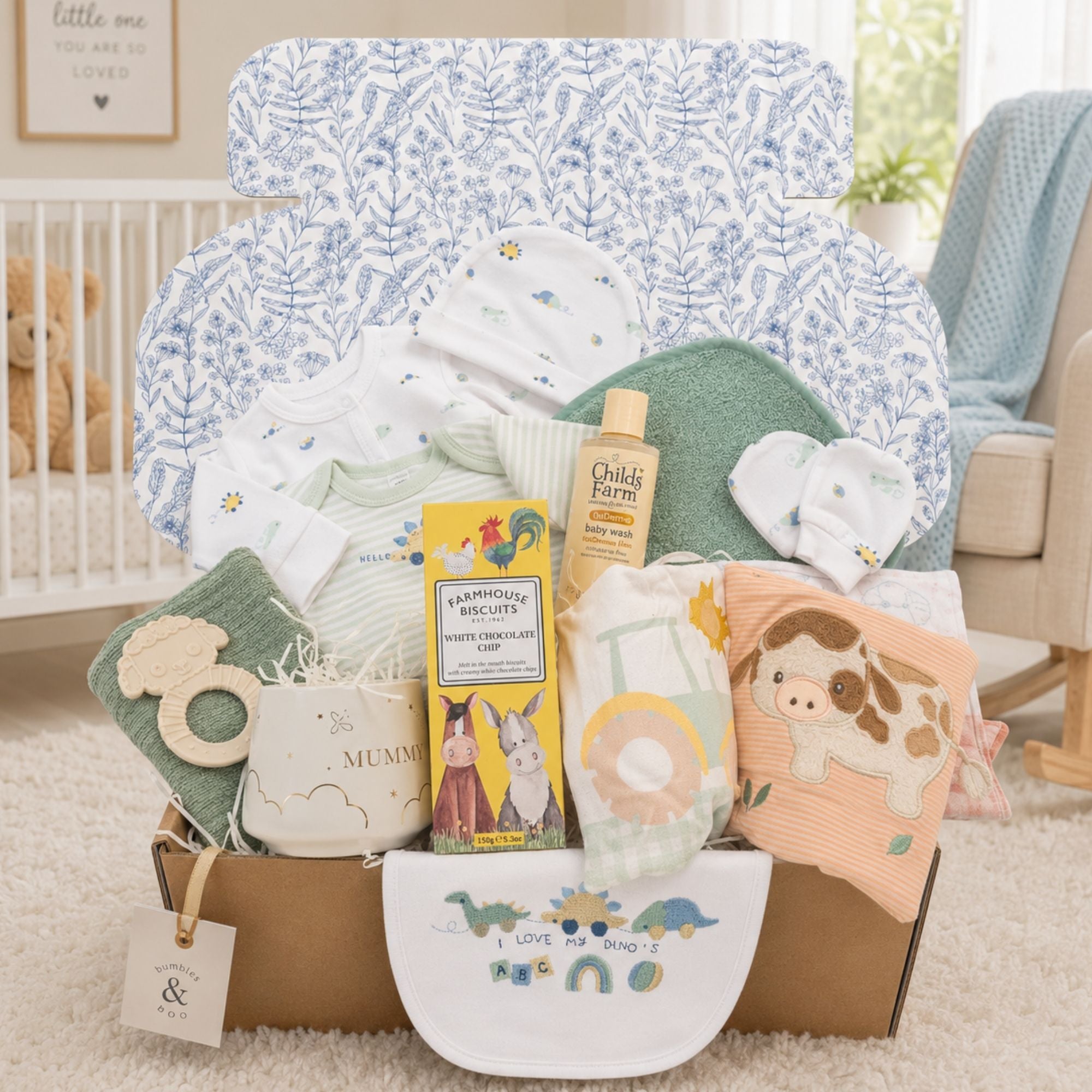 Beautiful new mum gift box with biscuits, mummy mug and dinosaur clothing set.