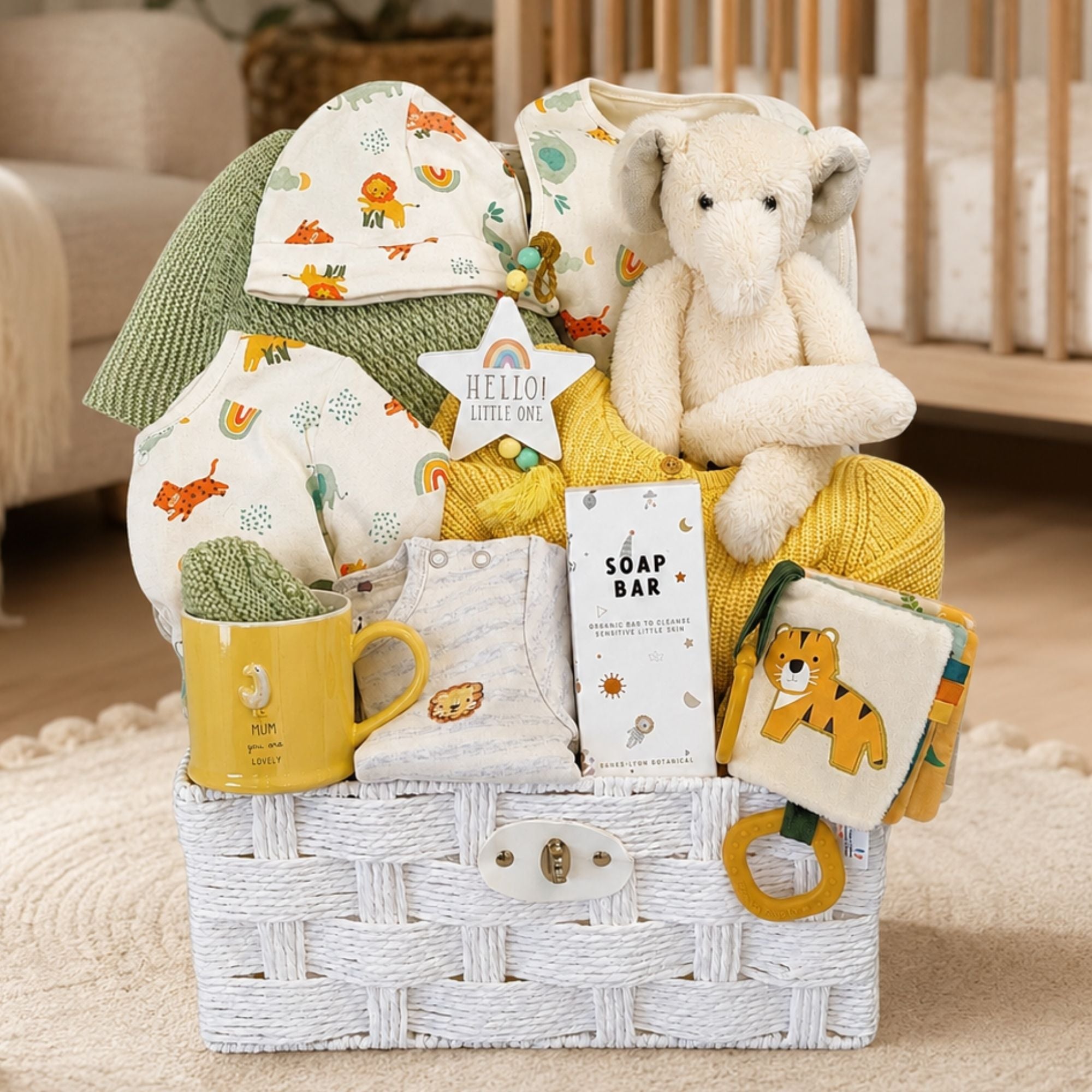 A new mummy gifts hamper with a yellow and green theme plus elephant and activity book.